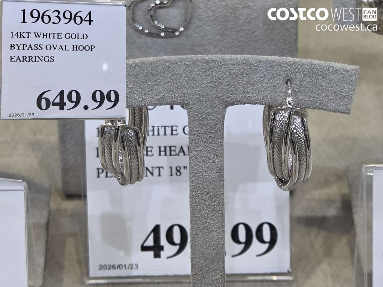 14KT WHITE GOLD BYPASS OVAL HOOP EARRINGS