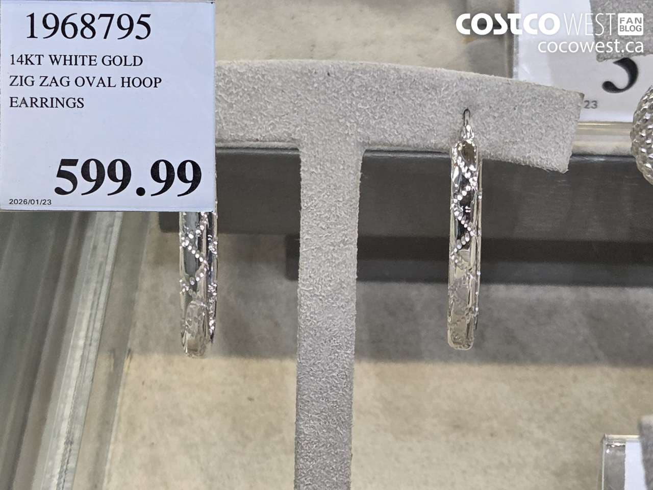 14KT WHITE GOLD ZIG ZAG OVAL HOOP EARRINGS